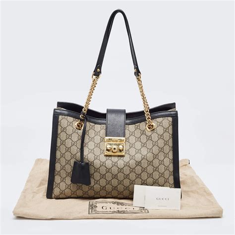 foulsrd gucci canavas|GG Supreme Canvas Padlock Medium Shoulder Bag .